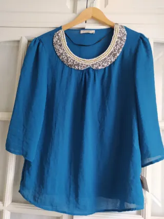 Blusa, cuello bebe con Pedrería t. L