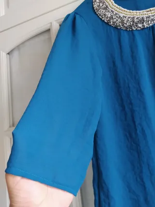 Blusa, cuello bebe con Pedrería t. L