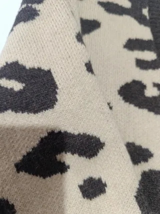 Rebeca/Cárdigan estampado leopardo,usado una vez,