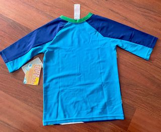 Polo Piscina Niño UV 50+ Starwars y Cars