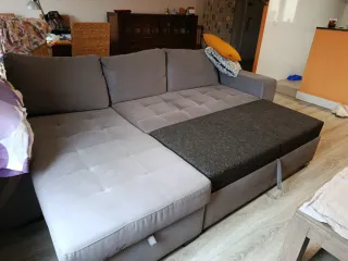 Sofá cama gris y morado