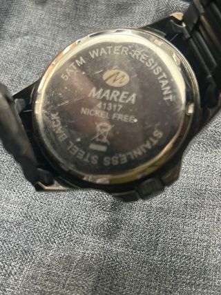 Reloj Marea Negro y Dorado