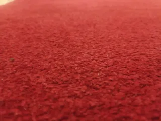 Alfombra roja de tela