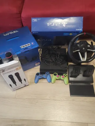 PS4 + 2 Mandos + Volante Racing Apex + 2 Micrófono