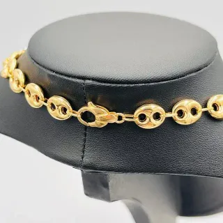 CADENA CALABROTE MEDUSA BICOLOR, Hueca. Oro 18k.