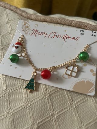 Pulsera navideña dorada con charms navideños nueva