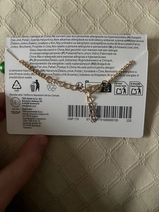 Pulsera navideña dorada con charms navideños nueva