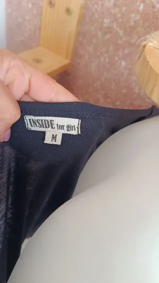 Camiseta cuello ancho manga larga negra