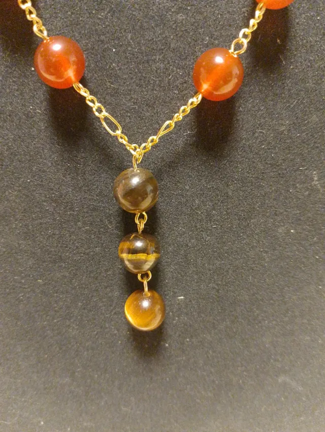 Collana oro con pietre arancioni