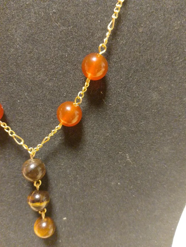 Collana oro con pietre arancioni