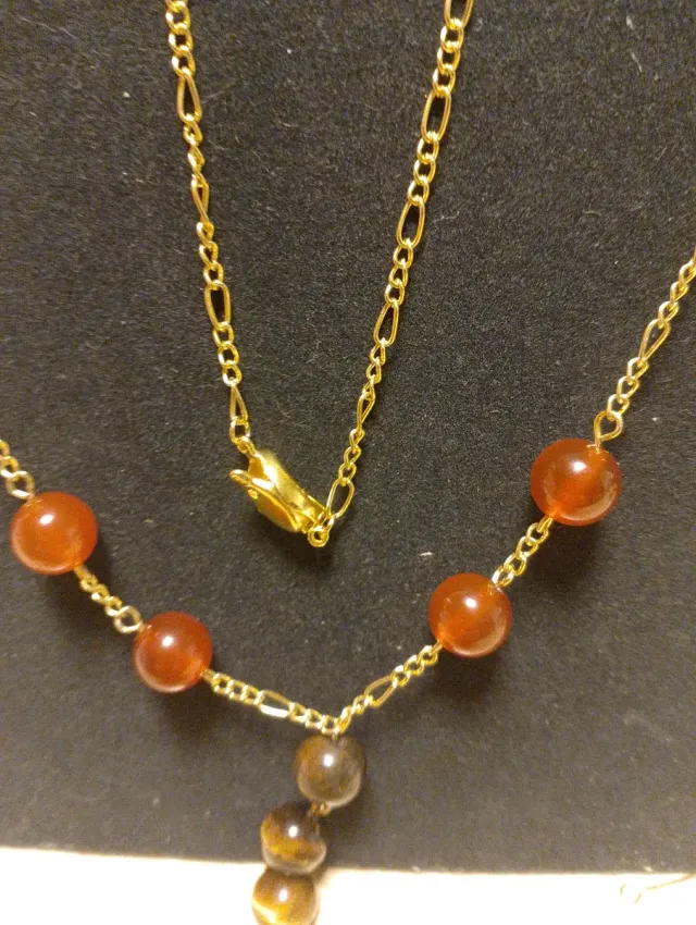 Collana oro con pietre arancioni