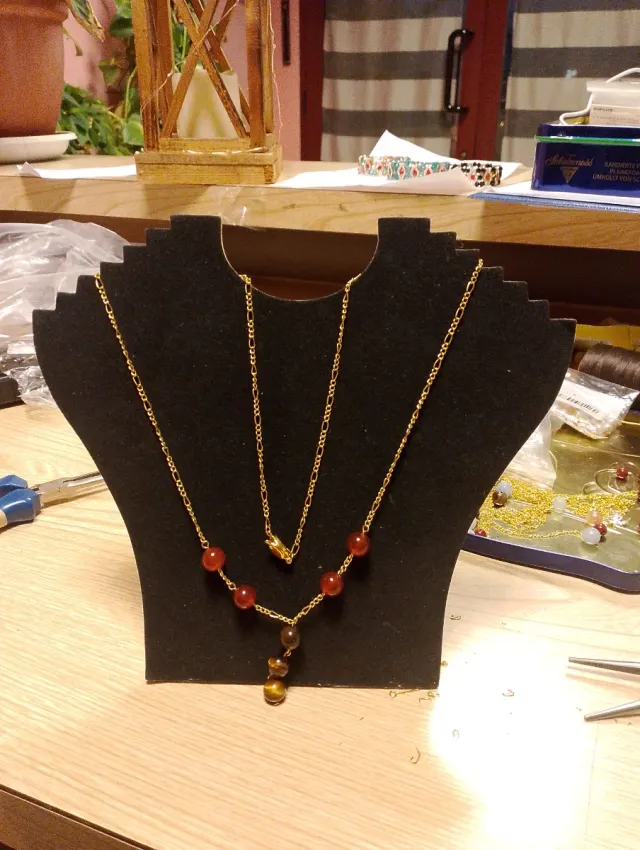 Collana oro con pietre arancioni