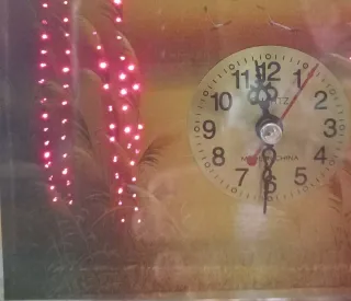 Orologio da appoggio con cornice a specchio