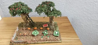 Figura Belén campesino con azada con huerto.