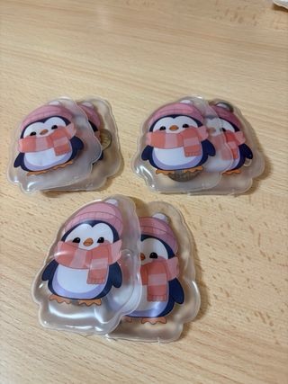 Calentadores de manos pingüino