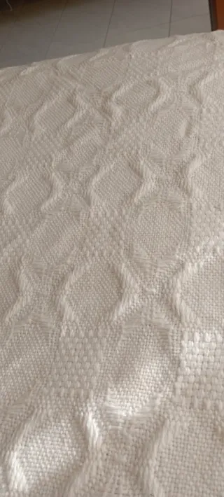 Coperta panna con frange in lana