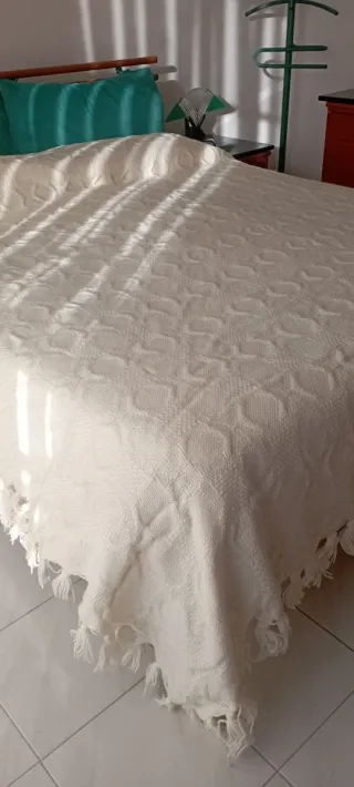 Coperta panna con frange in lana