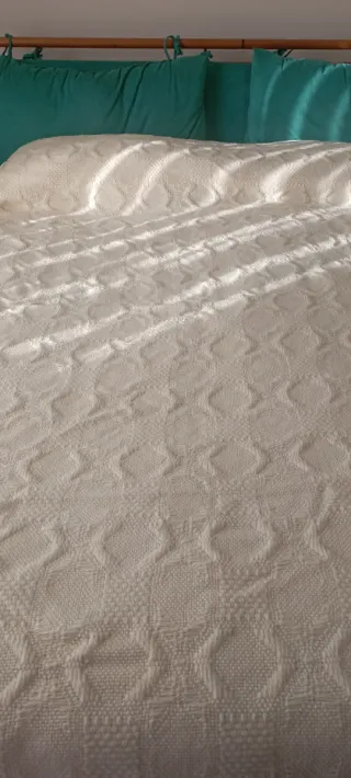 Coperta panna con frange in lana