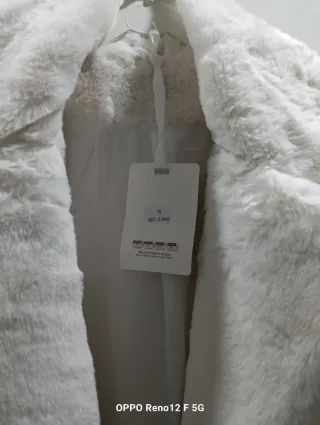 Casaco de pêlo branco