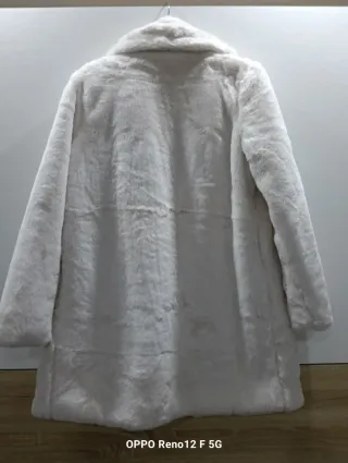 Casaco de pêlo branco