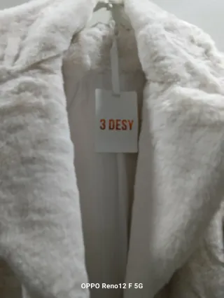 Casaco de pêlo branco