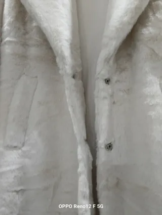 Casaco de pêlo branco