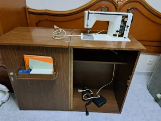 Máquina de coser poco usada