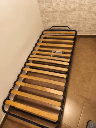 Cama plegable con ruedas y funda