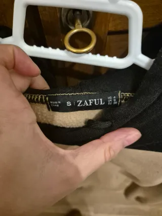 Sudadera calentita beige y negra