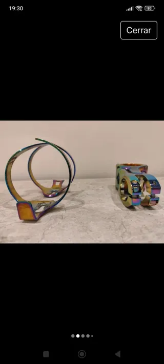 Potencia y Portabotellín Muqzi Arcoíris.