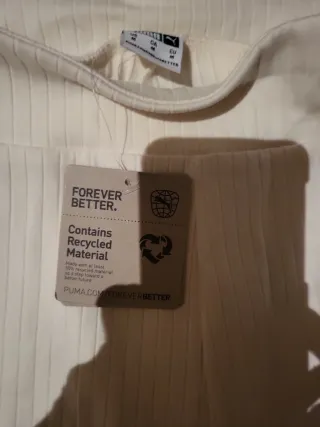 Pantalón chándal Puma Talla M .Color marfil.