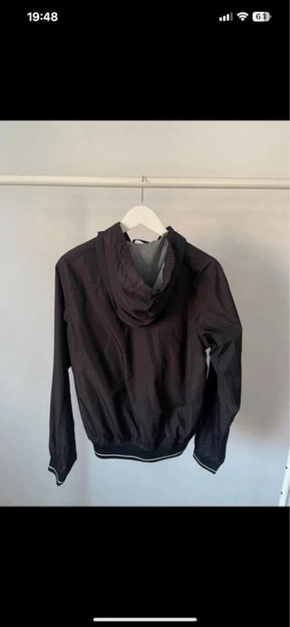 Chaqueta cortavientos negra con logo DB