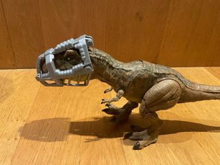 Dinosauro T-Rex Mattel con accessorio