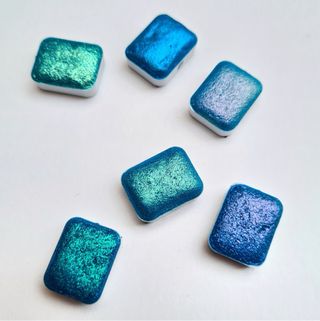 Acuarelas tornasoladas azules brillantes