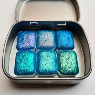 Acuarelas tornasoladas azules brillantes