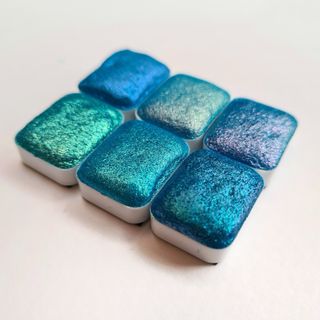 Acuarelas tornasoladas azules brillantes