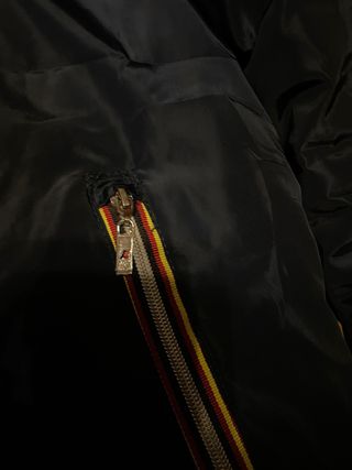 Chaqueta K-Way reversible plumas chubasquero