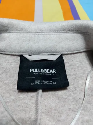 Abrigo Pull and Bear hueso.