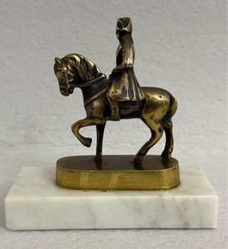 Antica statuina bronzo cavaliere