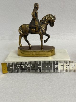 Antica statuina bronzo cavaliere