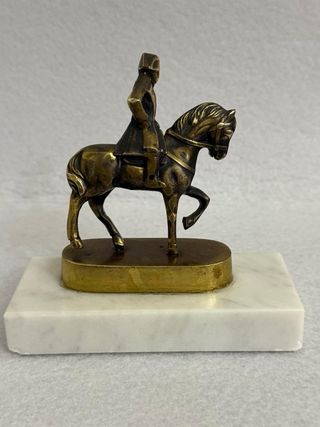 Antica statuina bronzo cavaliere