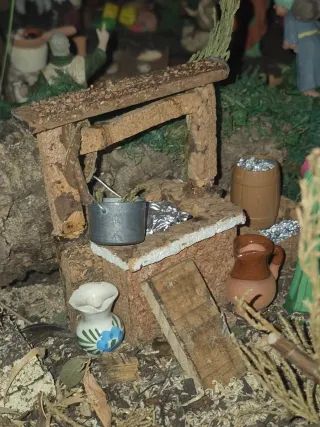 Pastor Belén sentado  atosa y pozos artesanales