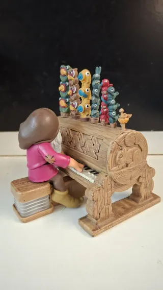 Pupazzo Brontolo pianista Disney