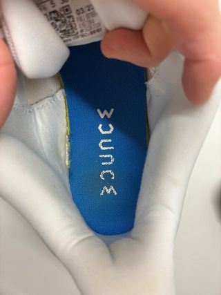 Zapatillas deportivas Adidas blancas y amarillas