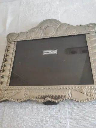 Cornice per foto con design in rilievo argentato