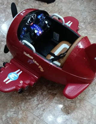 Avión a batería infantil rojo