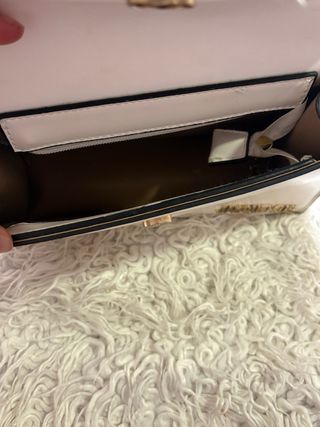 Bolso Jacquemus Blanco y Dorado.