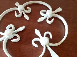 Coppia sottopentola/sottovaso in ferro battuto