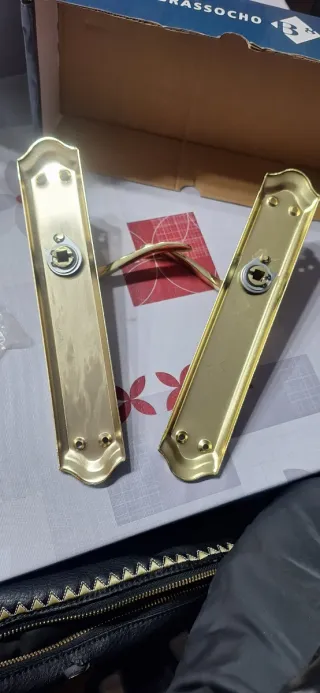 Manillas de puerta doradas juego de dos