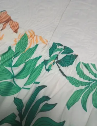 Pantalones largos estampados hojas